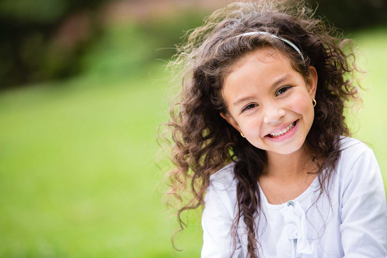 smiling girl outside pediatrics of dalton GA